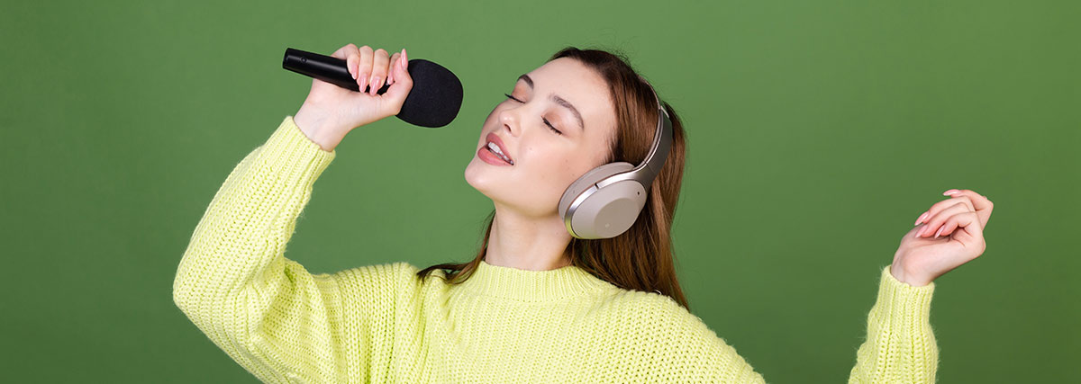 Lady with headphone singing