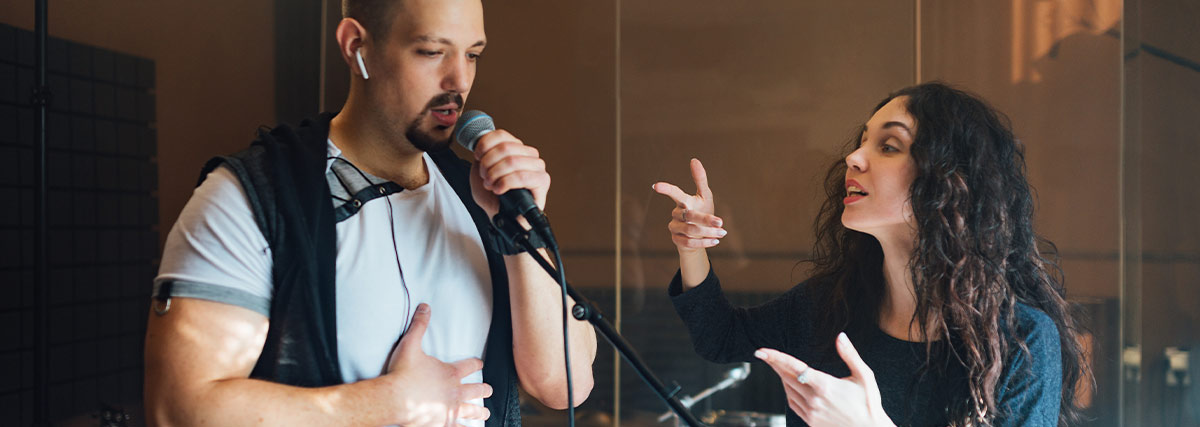 Man and woman in singing class