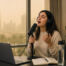 Woman practicing singing at home in Dubai