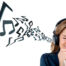 Woman enjoying music through headphones with musical notes, symbolising ear training and vocal development
