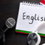 Microphone, headphones and British flag representing singing in English