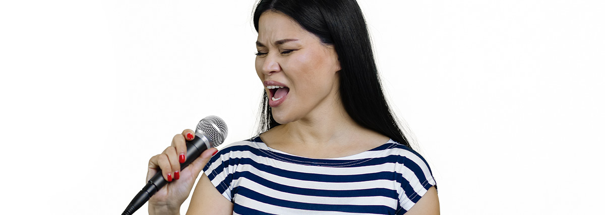 Singer practising to sing in English
